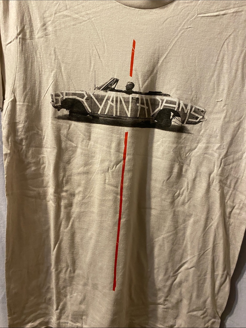 Bryan Adams Gildan Cream Short-Sleeve Tee with wBlack Car Graphic and Red Stripe